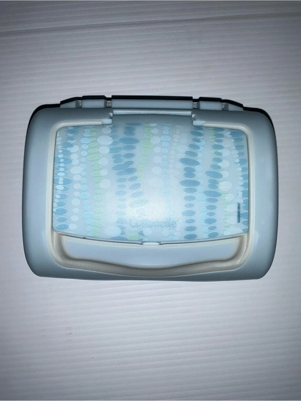 Cottonelle Mostly Colored Blue w/ Green with Word Logo Print Top Pop-Up Dispense